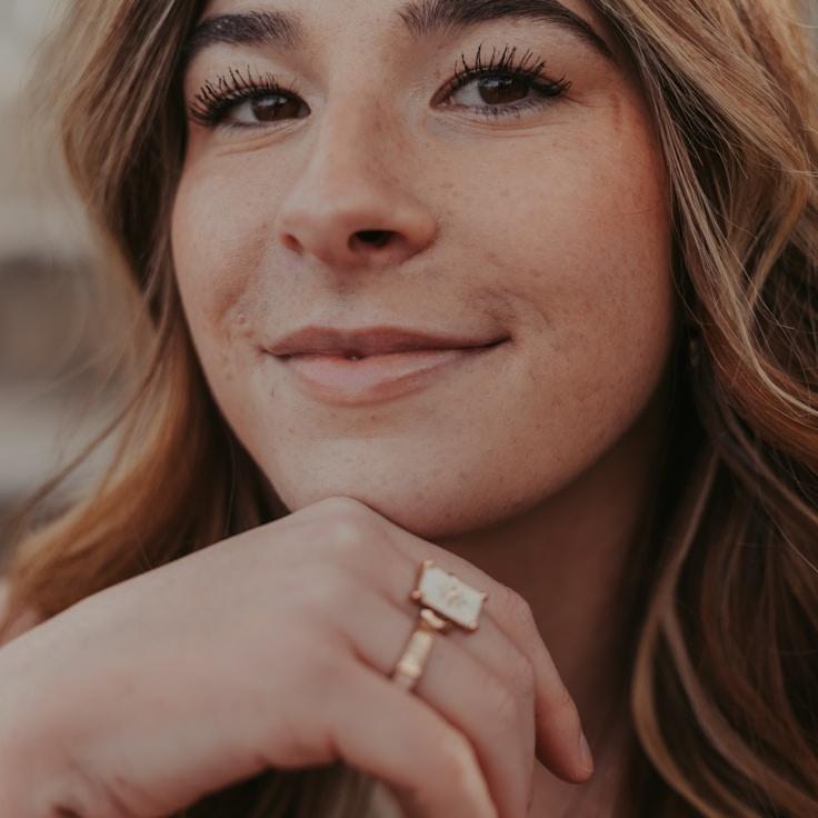 Kaveri Mehta, Lead Design Curator at Service Journey Smooth, reviewing corporate floral arrangements